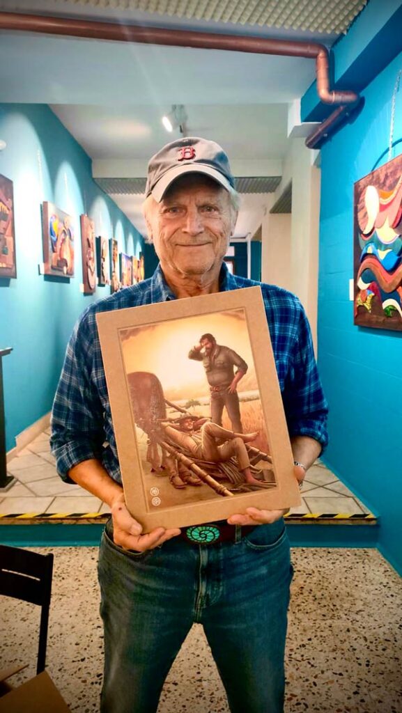 Terence Hill con il quadro di Alberto Baldisserotto, nobilitato da Artory